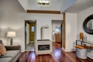 The vaulted ceilings and stunning wood detailing in the main living area makes one catch their breath at the well thought out renovation. Uses vertical space to make the home live larger.