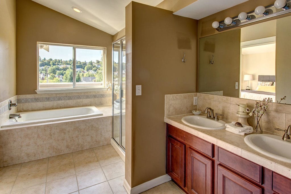 Master bathroom with luxurious soaker tub, glassed in shower, dual sinks & more. 