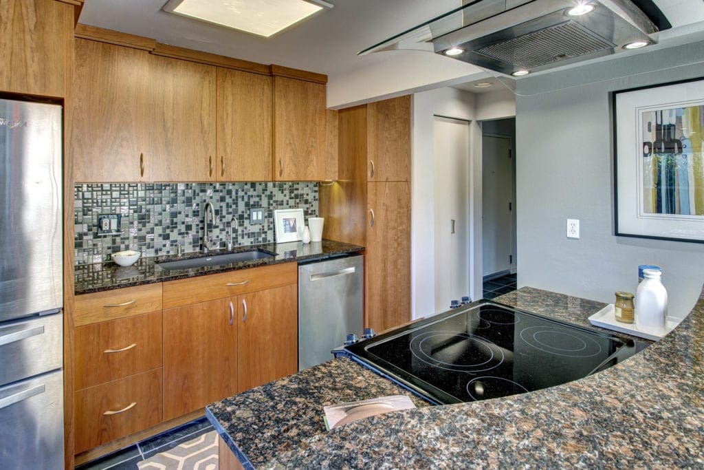 Custom designed gourmet kitchen with plenty of storage.