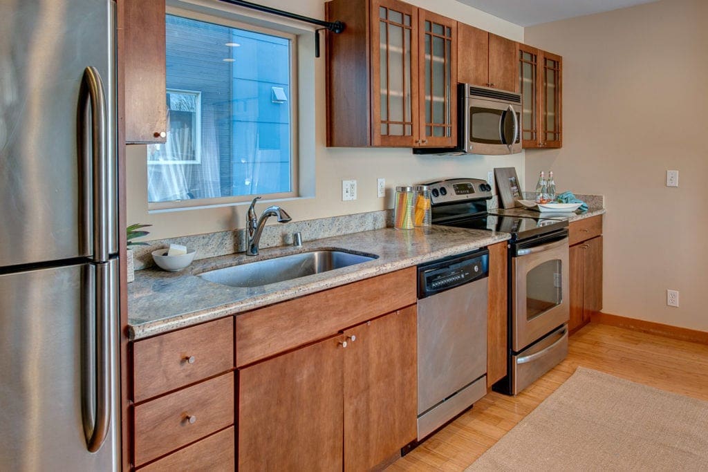 Granite Countertops and Stainless Steel Kitchen