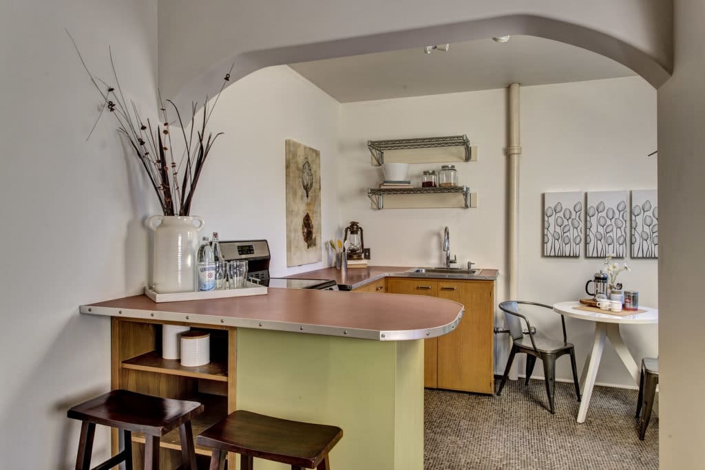 Breakfast bar & dining nook in the updated kitchen.