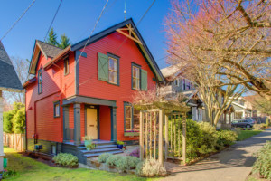 Single family craftsman house in Wallingford neighborhood of Seattle, Washington. House has mature landscape on level yard.