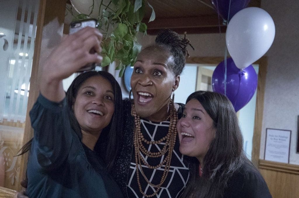 Andrea Jenkins takes a selfie with supporters.