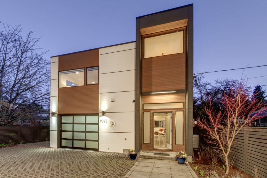 We Captured the Grandeur of this Unique Modern Maple Leaf Home by Photographing it During the Evening