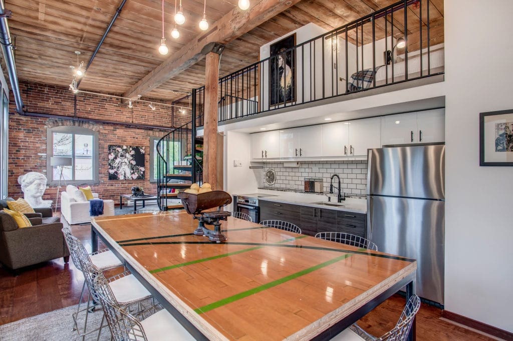 Pike Place Market Loft Kitchen, Dining Area, Living Area, Spiral Staircase and Loft Bedroom