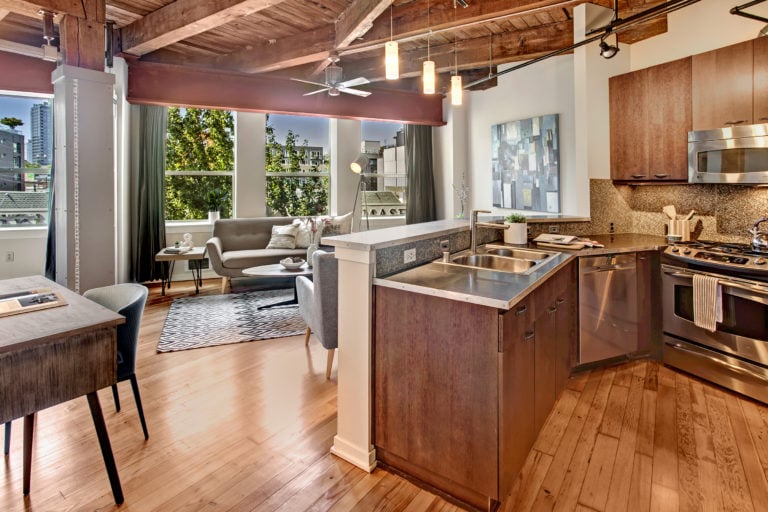 Capitol Hill Loft Condo Open Living Area and Stainless Steel Kitchen