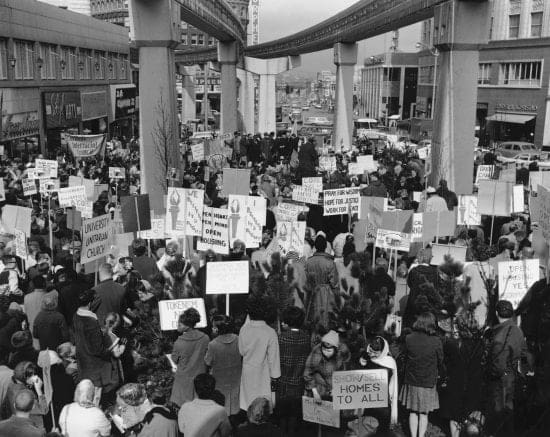 An historical image of an Open Housing rally at Westlake from Wing Luke Museum's Excluded, Inside the Lines exhibit