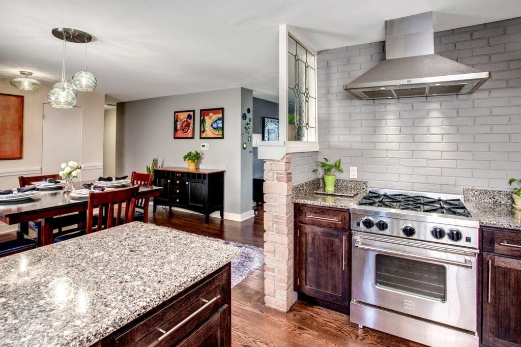 Mid-Century Meadowbrook Home Kitchen, Stainless Steel Appliances, Dining Area