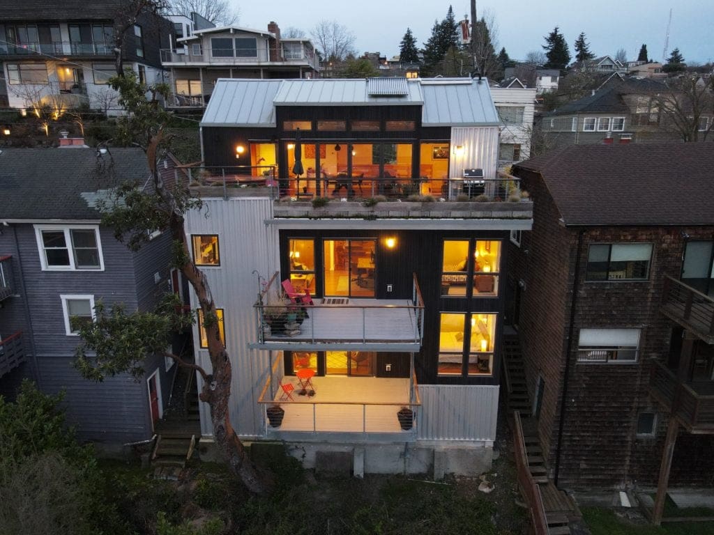 Modern-Queen-Anne-View-Home-Drone-Aerial-Twilight-View-Rooftop-Deck-Top-Floor-Open-Living-Area-Private-Decks-Hot-Tub-Rental-Suite-Home-Office-Owners-Room