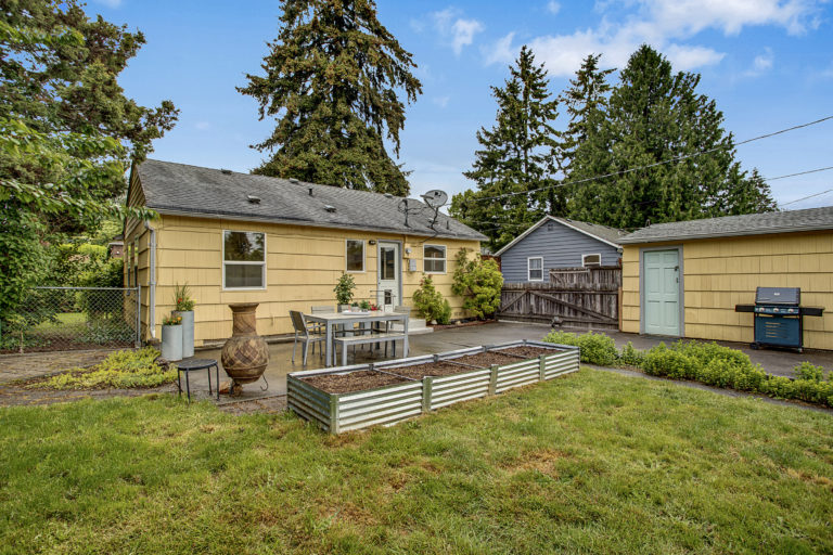 Classic Arbor Heights Bungalow Backyard and Paved Patio