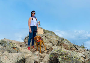 Team Diva Real Estate - Seattle - National Hiking Day - photo of woman at top of mountain with dog