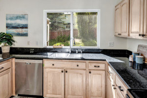 Kenmore Home Kitchen has a view of the back lawn too