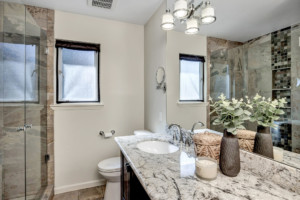 Kenmore Home Primary Bathroom with a big mirror and a big shower, with a small frosted window