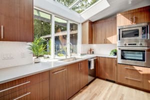 Kenmore Mid Century Home Kitchen with vaulted ceilings wall of windows and skylights