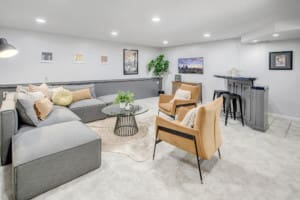 Kenmore Mid Century Home Downstairs basement media room with a bar