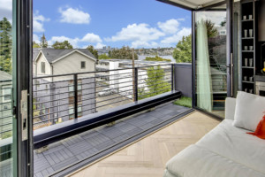 South Lake Union Modern Townhouse Entertaining space wall of windows open to second view