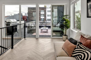 South Lake Union Modern Townhouse top floor entertaining suite with view of rooftop deck