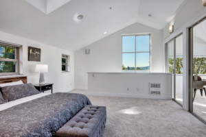Leschi Townhouse Primary bedroom vaulted ceilings with lots of south facing windows
