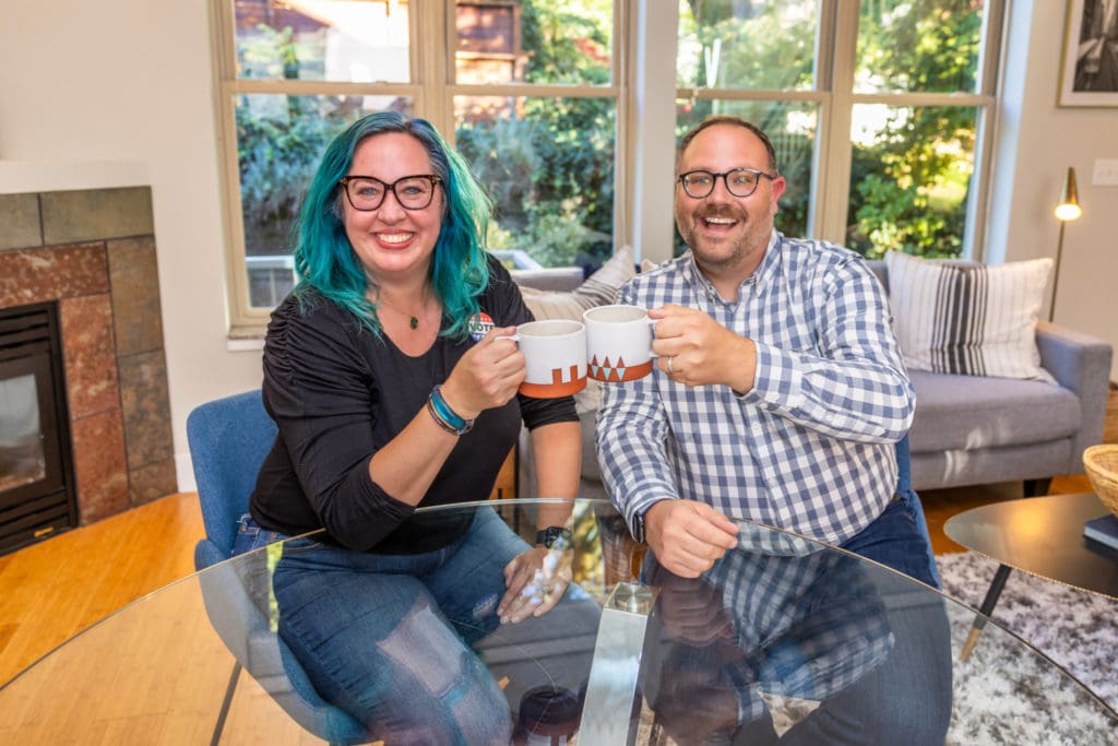 Chavi and Roy sat at a table, enjoying coffee together