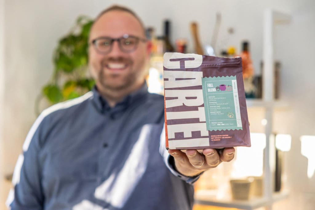 Roy Powell Posing with Cartel Coffee