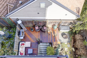 Drone view of deck and patio of Columbia City townhouse.