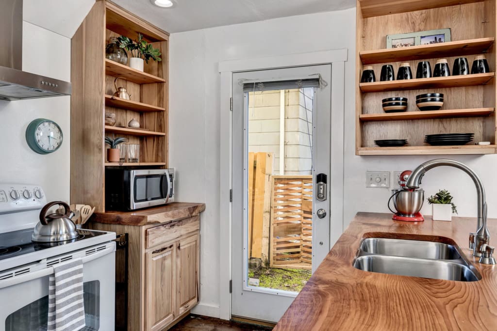 Columbia City home with view of kitchen to the entrance door