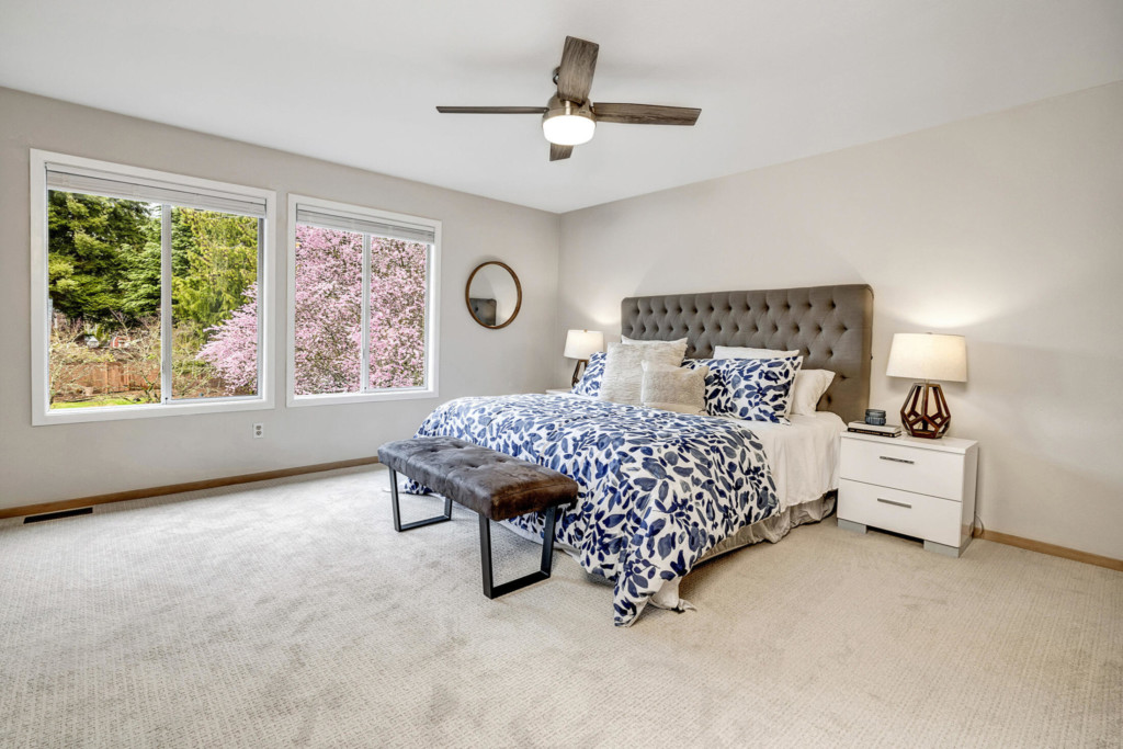 Photo of fourth bedroom bed and ceiling fan at a home in Lynnwood.