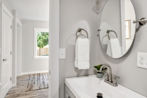 Burien Cottage Home - Bathroom with mirror.