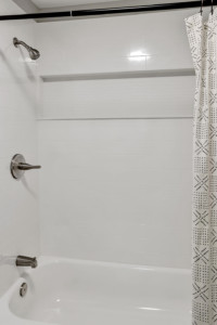Burien Cottage Home - Bathroom shower tiling.