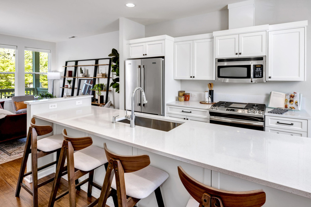 Columbia City Townhome - view of kitchen Island with countertop barstools.