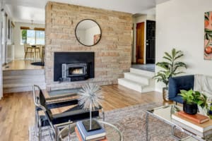 Living room fireplace and entry stairs