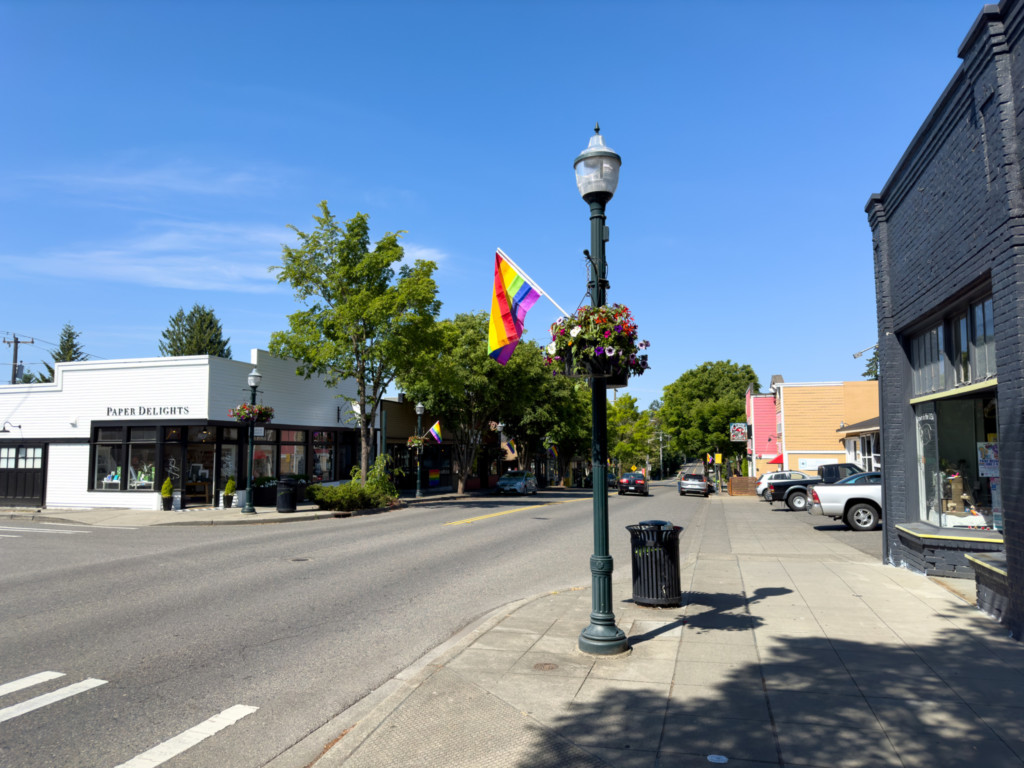 Old Town Burien on the main street with a pride flag