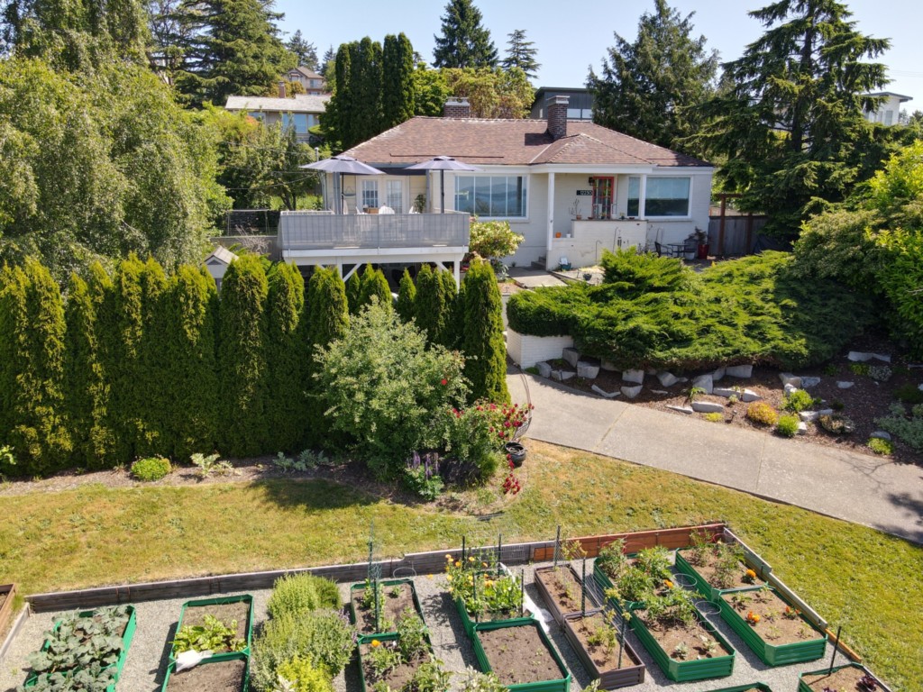 Modest home in Shorewood of Burien Washington with a huge summer garden. 