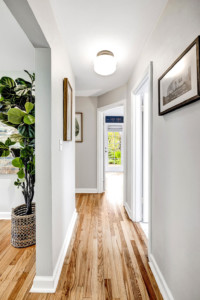 Hallway and lighting with hardwood floors