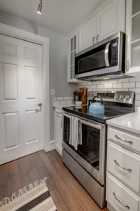 Kitchen stovetop, oven and cabinetry