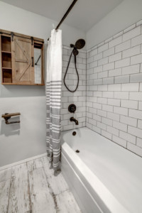 Bathroom tub and modern shower fixtures