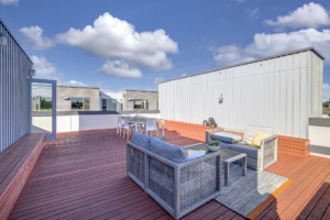 Rooftop deck furniture and slatted wood floor