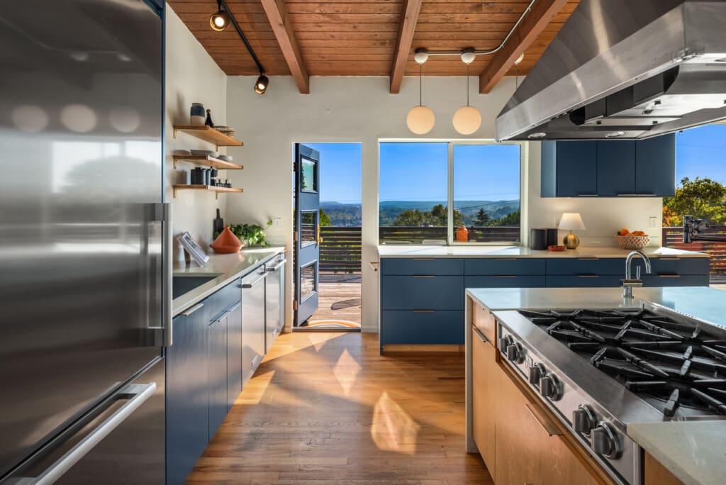 Remodeled kitchen in a Seattle custom built mid-century modern home with a Blue Star range