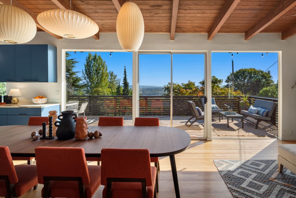 Custom built mid-century modern home opened directly to the open deck with views of Mount Rainier