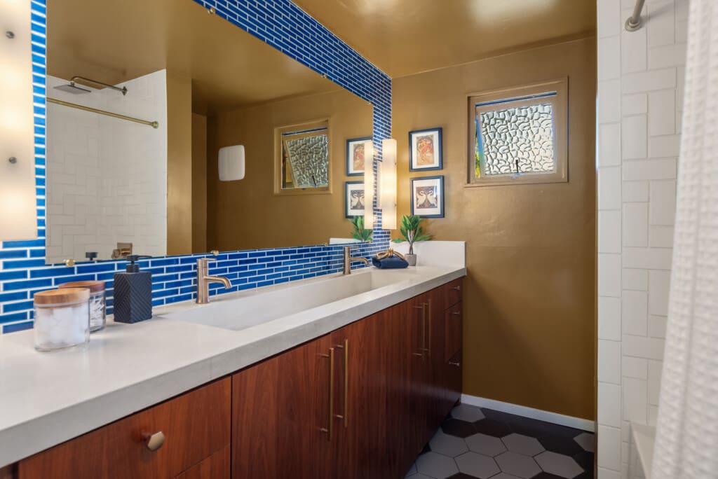 Renovated mid-century modern home's bathroom Bathroom with handmade Fireclay tile and a custom concrete sink