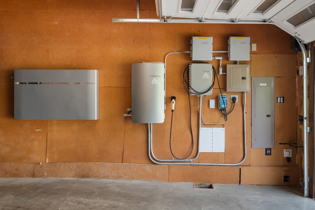 Updates and upgrades to this custom built Redmond home include a full solar panel system and EV chargers